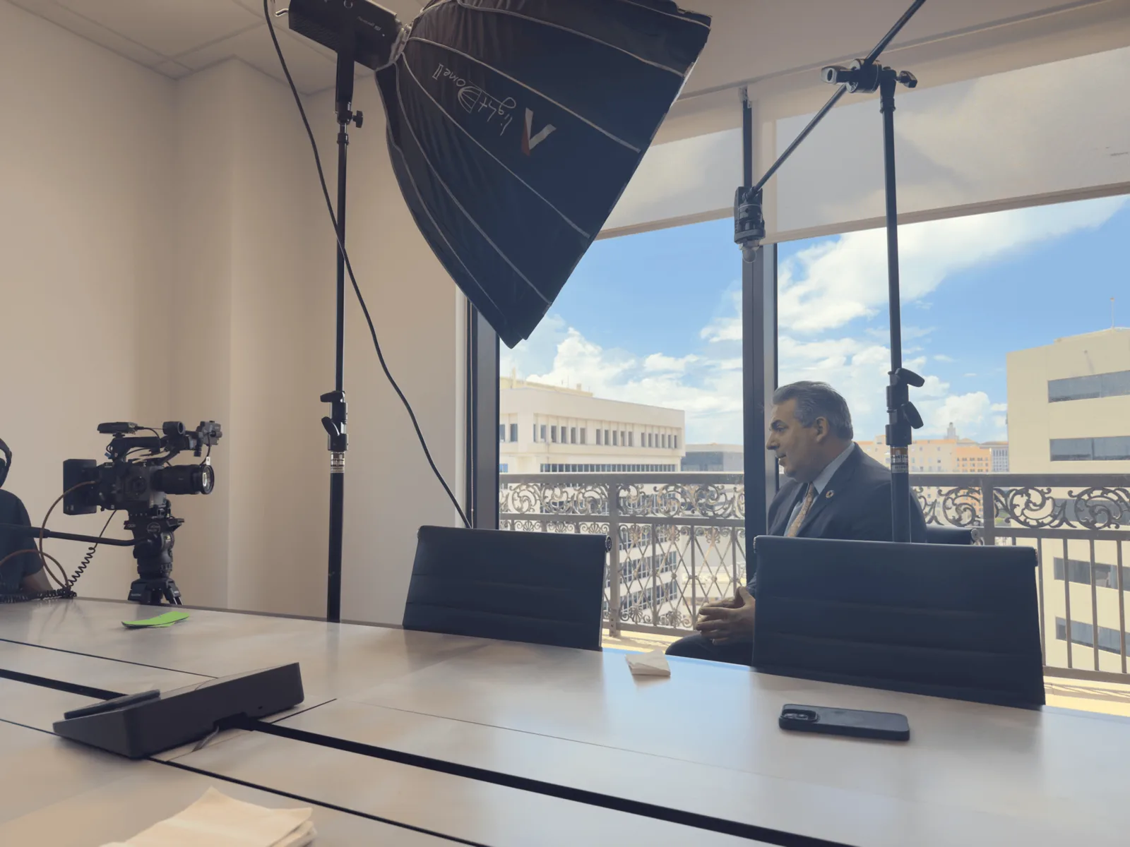 Executive interview setup in a boardroom — RiseWorks enterprise video production