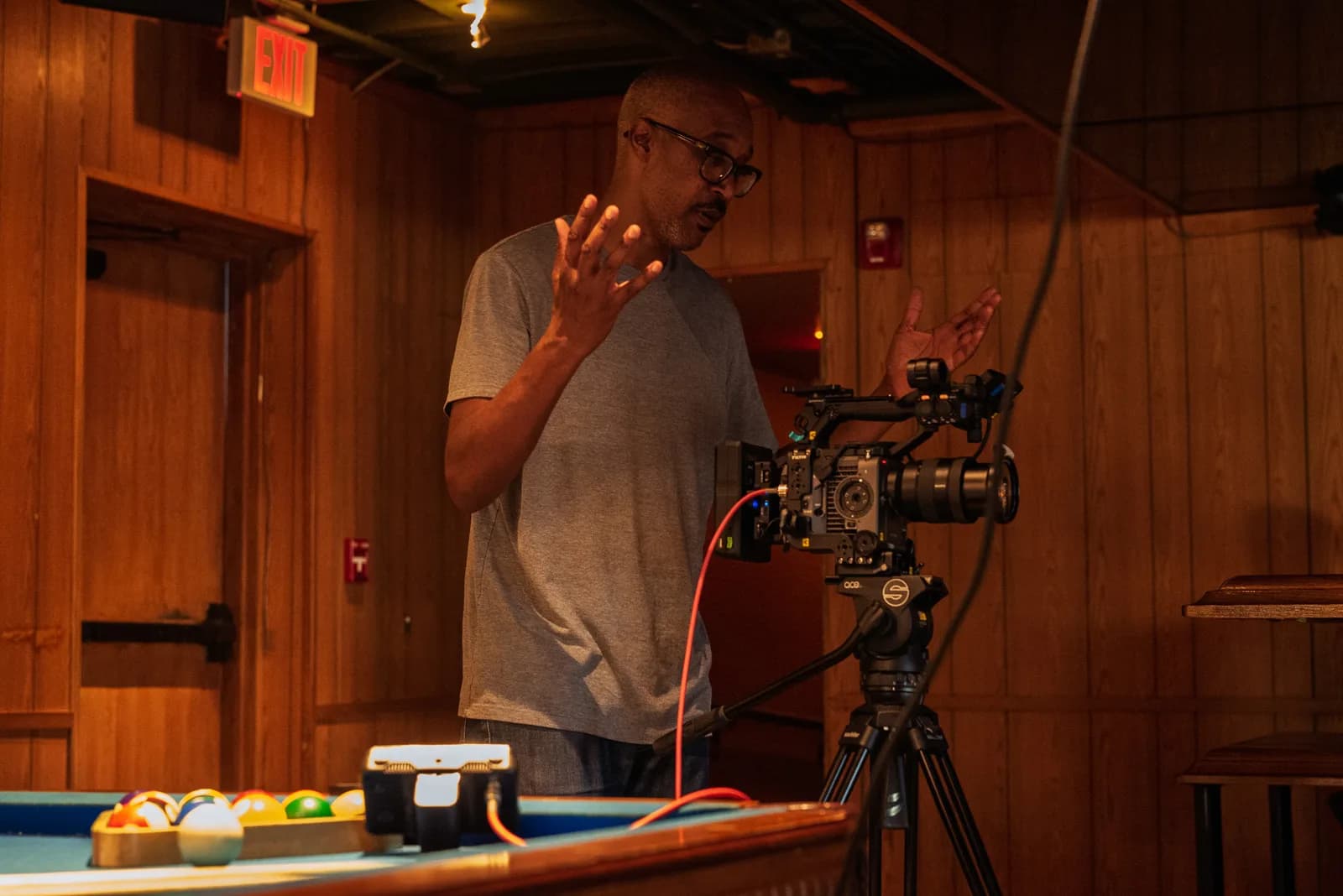 Creator directing a video production on set
